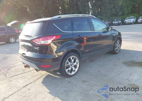 2016 Ford Escape Titanium z USA, uszkodzony, nr VIN 1FMCU9J94GUB58973